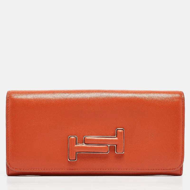 Wallets with trifold styles-Tod's Burnt Orange Leather Flap Continental Wallet..